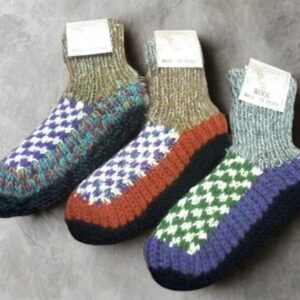 Three patterned hand-knitted wool slipper socks